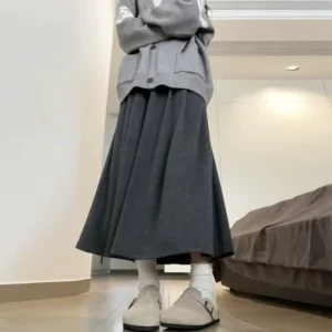 Grey glutinous rice skirt children's autumn 2025 new high waist slimming A-line umbrella skirt medium long knitted half body skirt